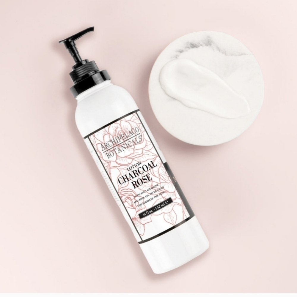 NEW Archipelago Charcoal Rose Body Lotion - dented bottle.